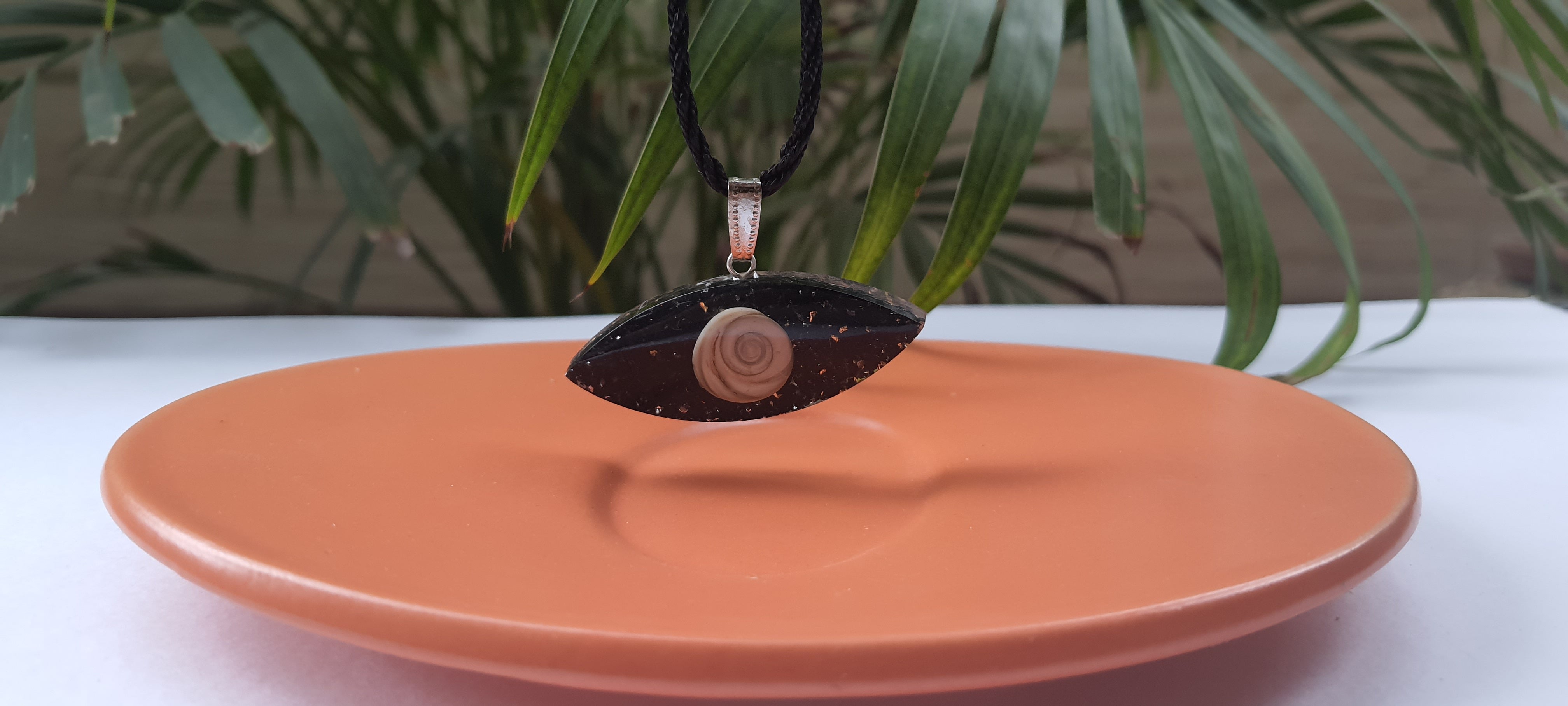 Evil Eye Orgonite pendant with Black tourmaline and Gomti chakra